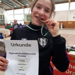 Glückliche Bronzemedaillengewinnerin